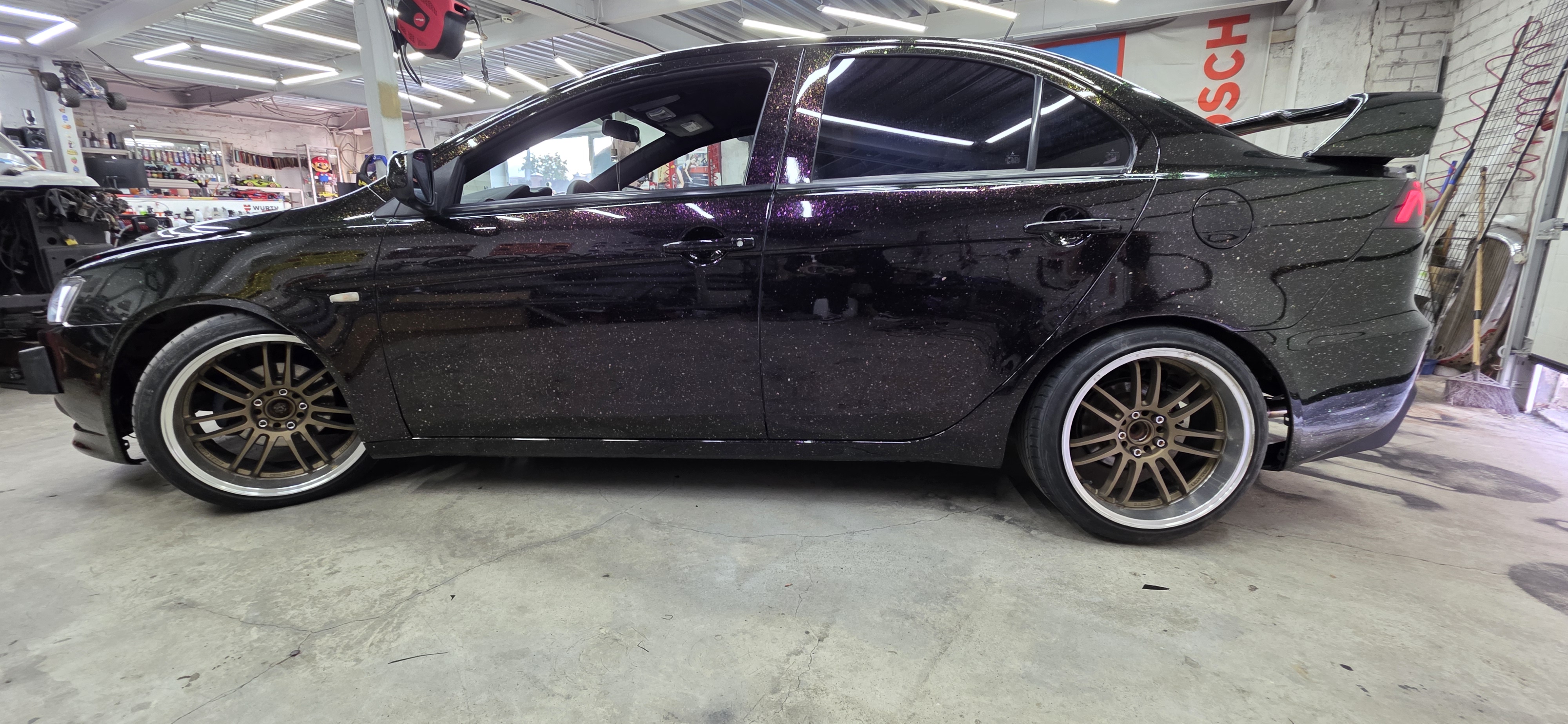 Mitsubishi Lancer 10 — оклейка защитной полиуретановой плёнкой CARLAS, - работа 4